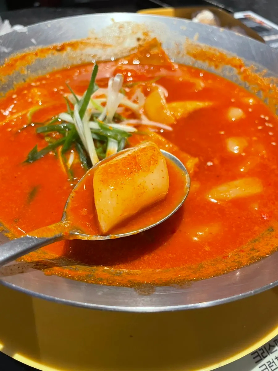 Soup tteokbokki with wheat and rice rice cakes and fish cakes