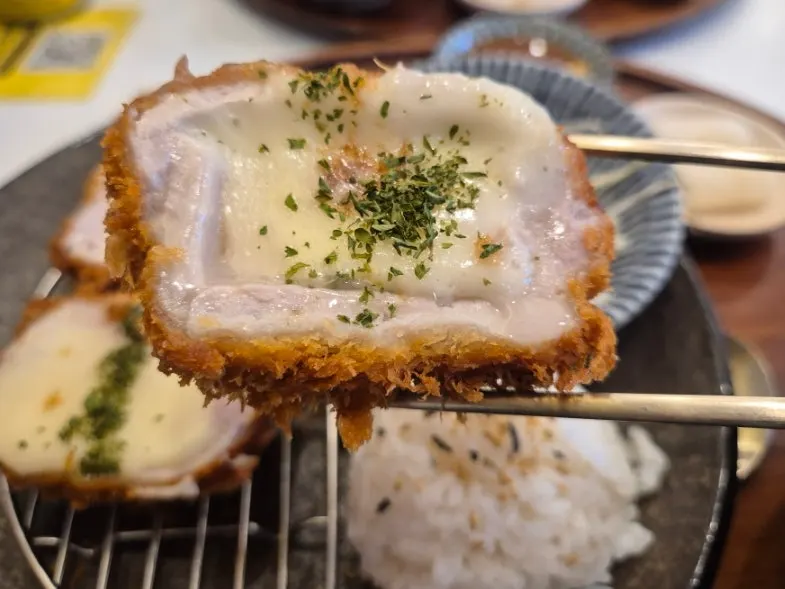 Cross-section of tonkatsu filled with cheese