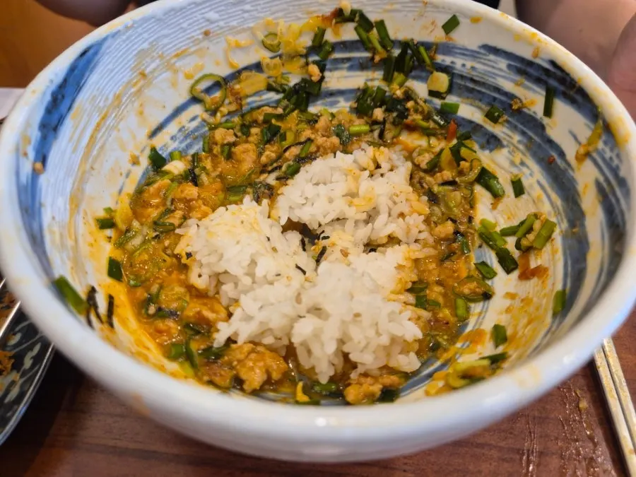 Rice mixed into leftover mazesoba sauce