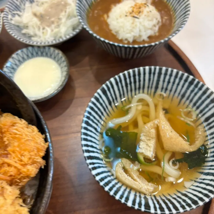 Nearly finished bowl of katsudon