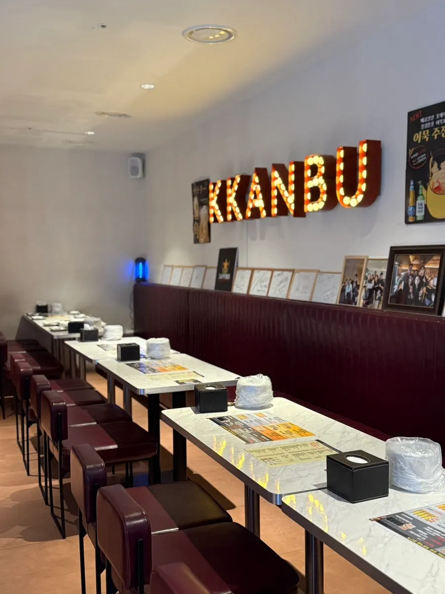 Evening view of the terrace tables at Kkanbu Chicken