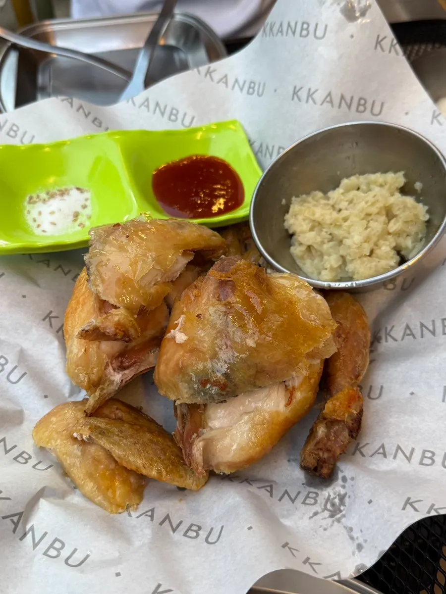 A plate of garlic rotisserie chicken delivered to the wrong table