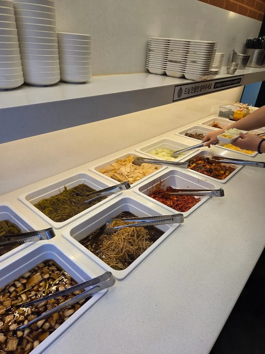 Wrap greens and side dishes at the self-service bar