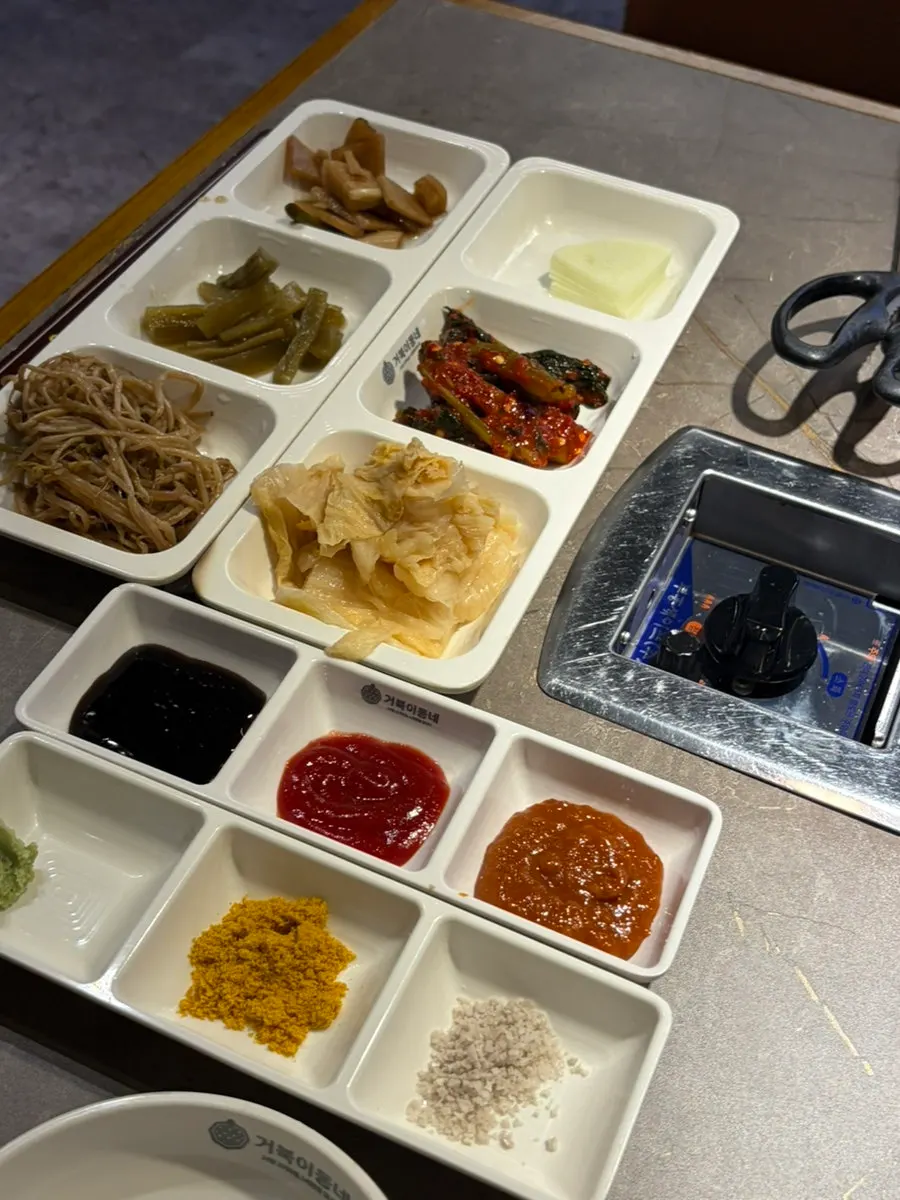Table setting with sauces and sides prepared