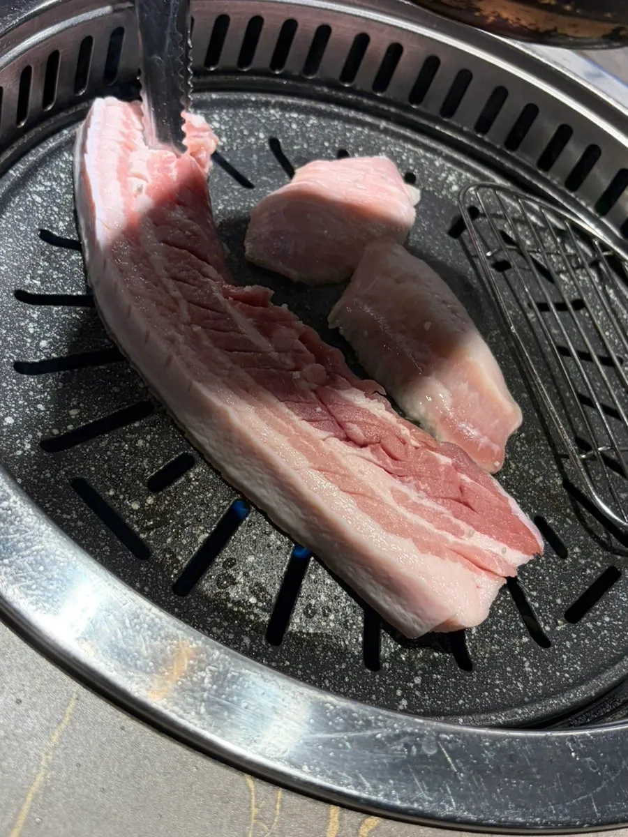 Pork jowl and pork belly cooking together