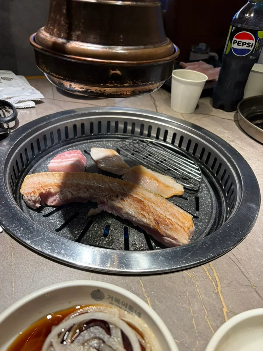 A glistening, well-cooked piece of pork belly