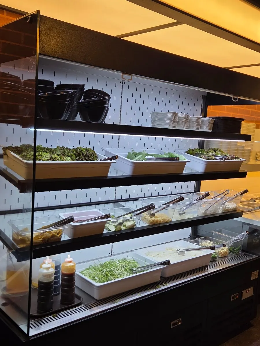Inside the restaurant showing high chairs and the kids' video room