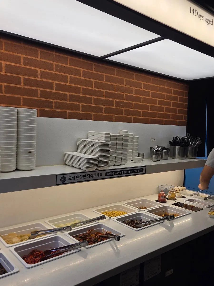 Vegetables and side dishes at the self-serve corner