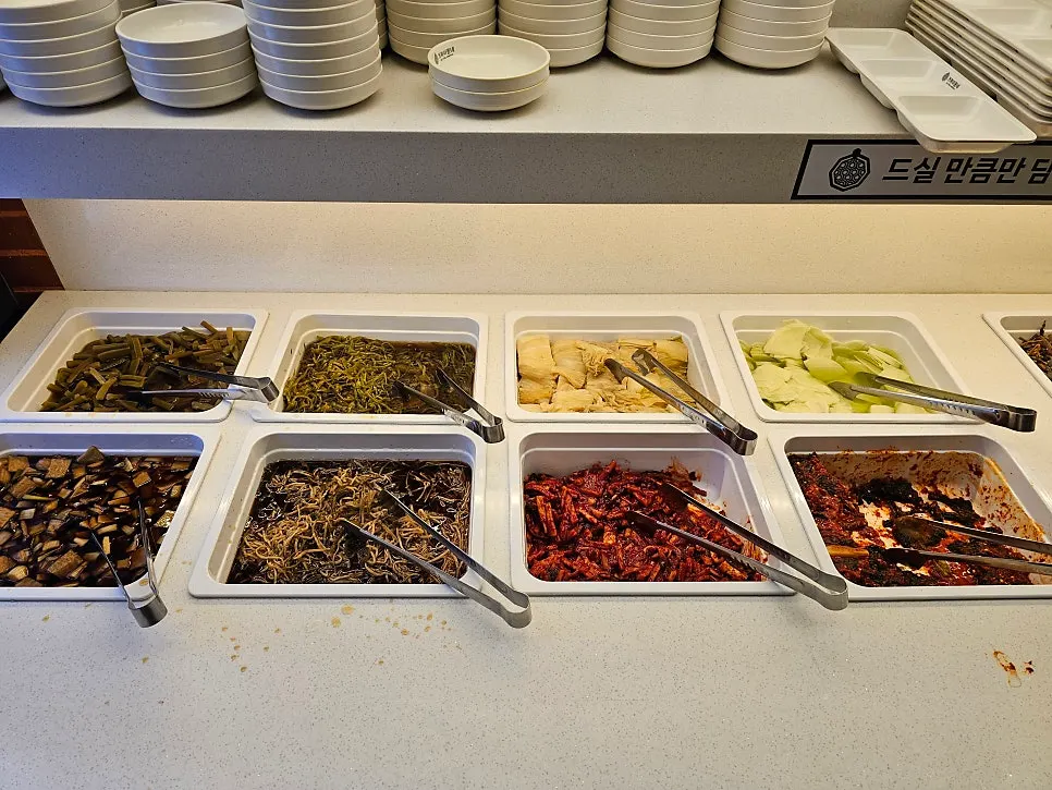 Self-serve bar with side dishes and wrap vegetables