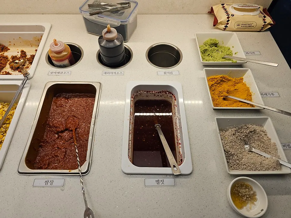 A plate of side dishes gathered from the self-serve bar