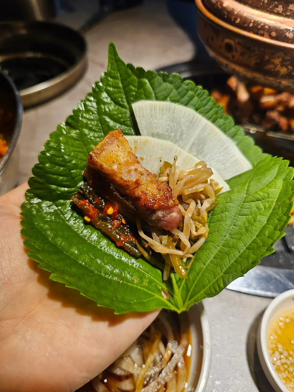 A golden-brown piece of grilled pork belly