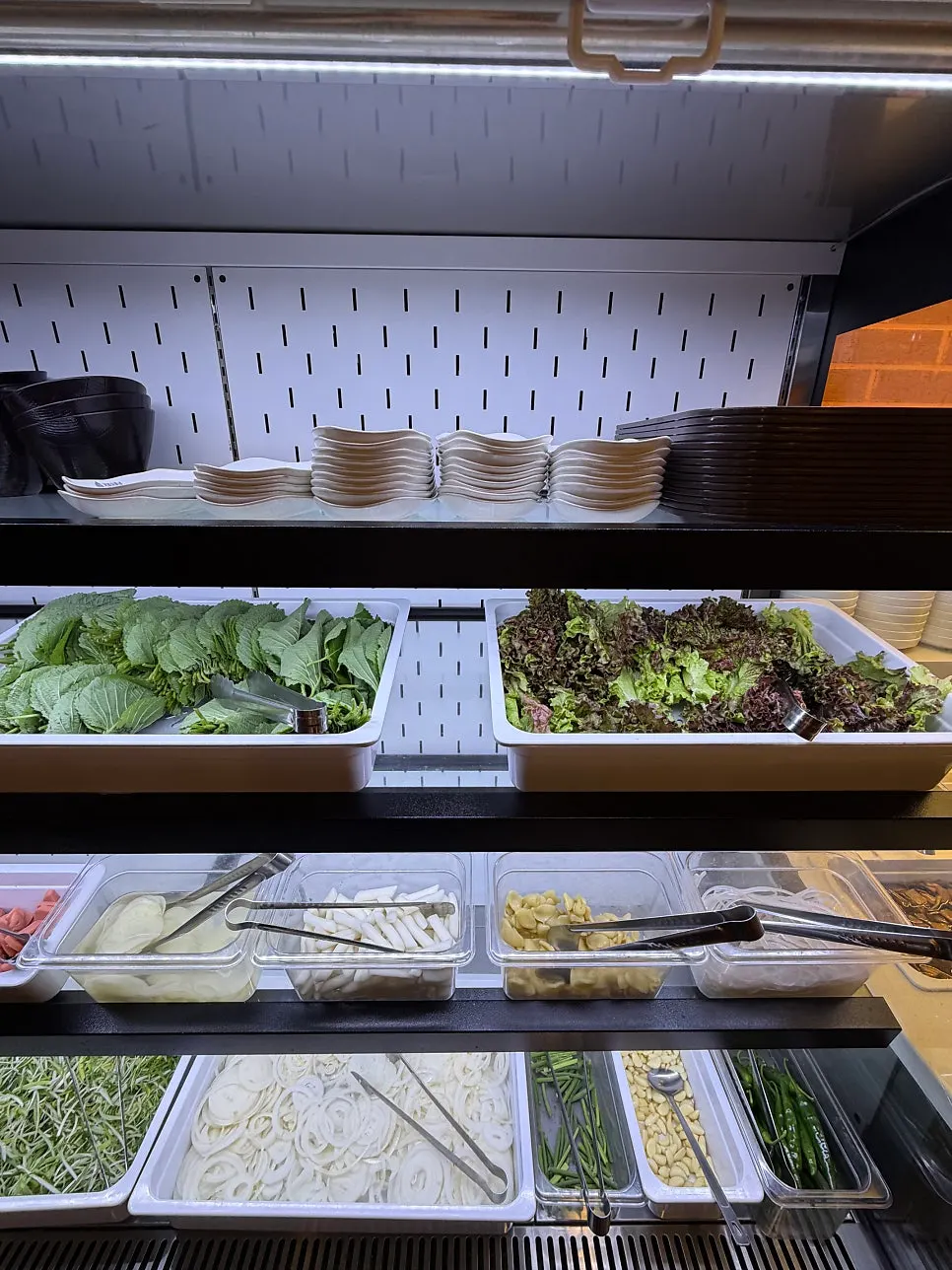 Wrapping greens display at the self-serve corner