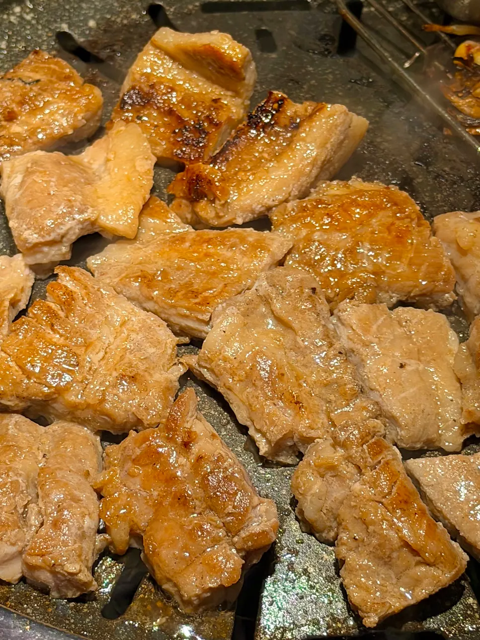 Marinated pork ribs grilling on the pan