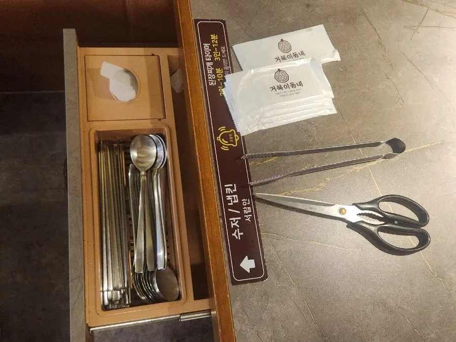 Self-serve bar fee sign and side dish corner