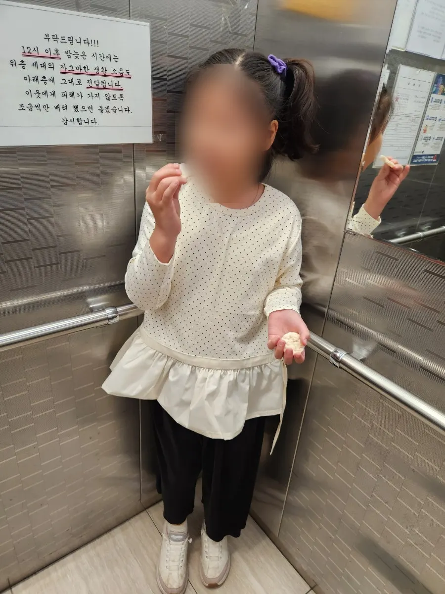 Frilly top paired with comfortable pants for school