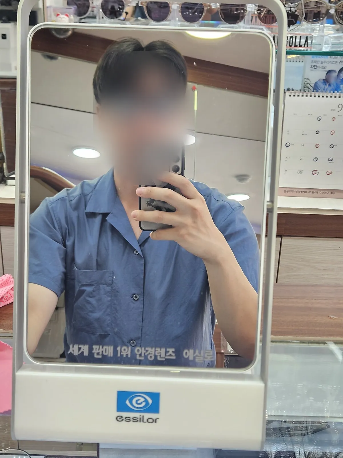 Trying on a frame recommended by staff