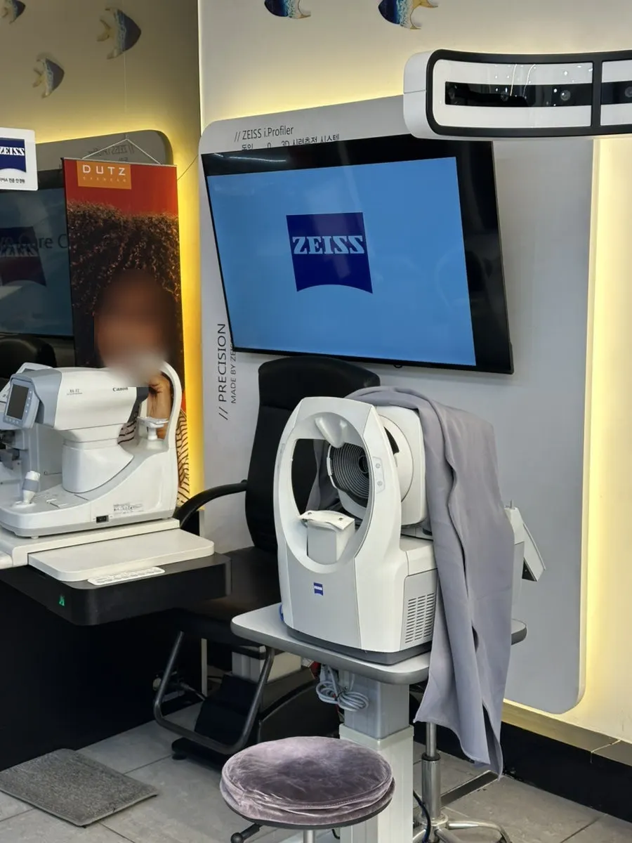 Precision eye exam measuring equipment at 007 Optical