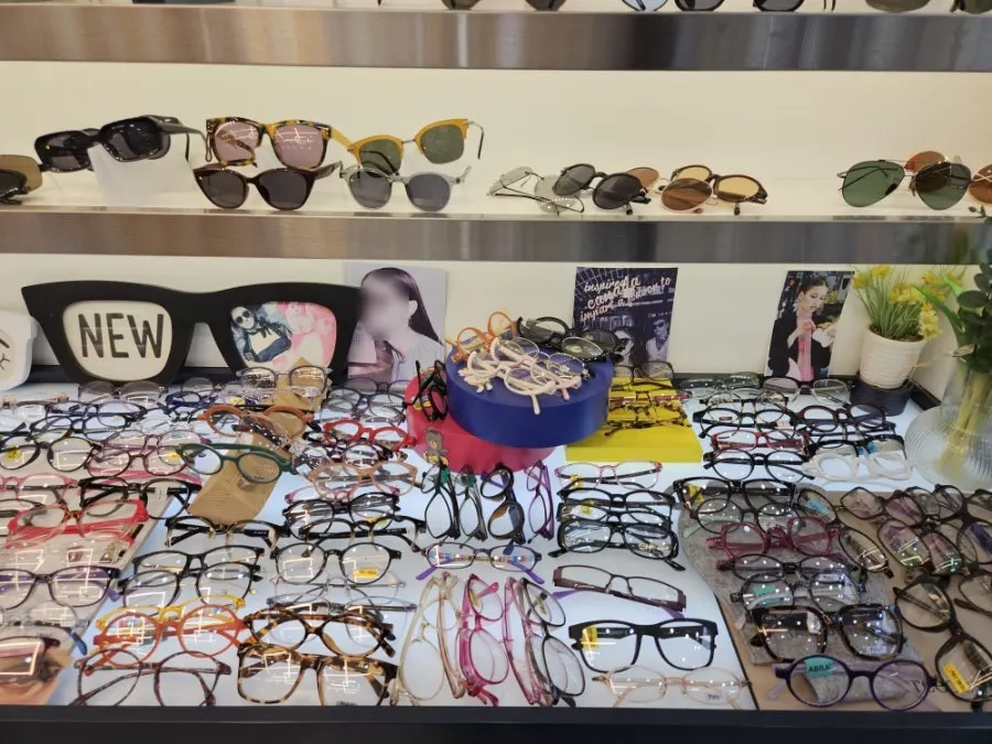 Display case with metal and horn-rim frames together