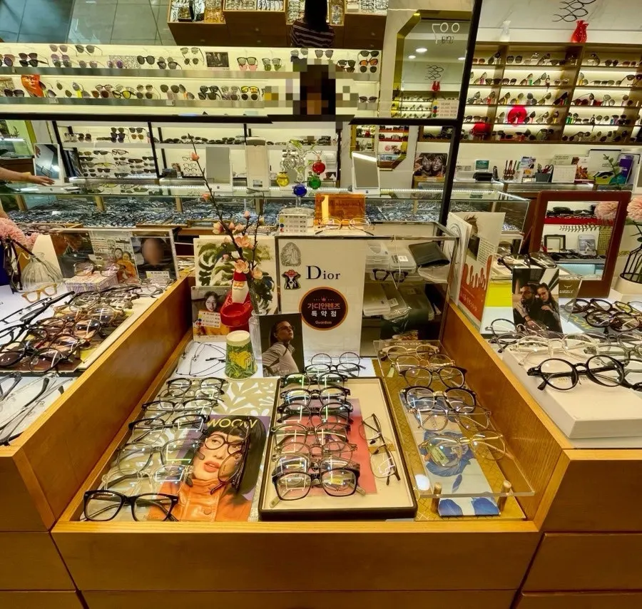 Display case with glasses from various brands