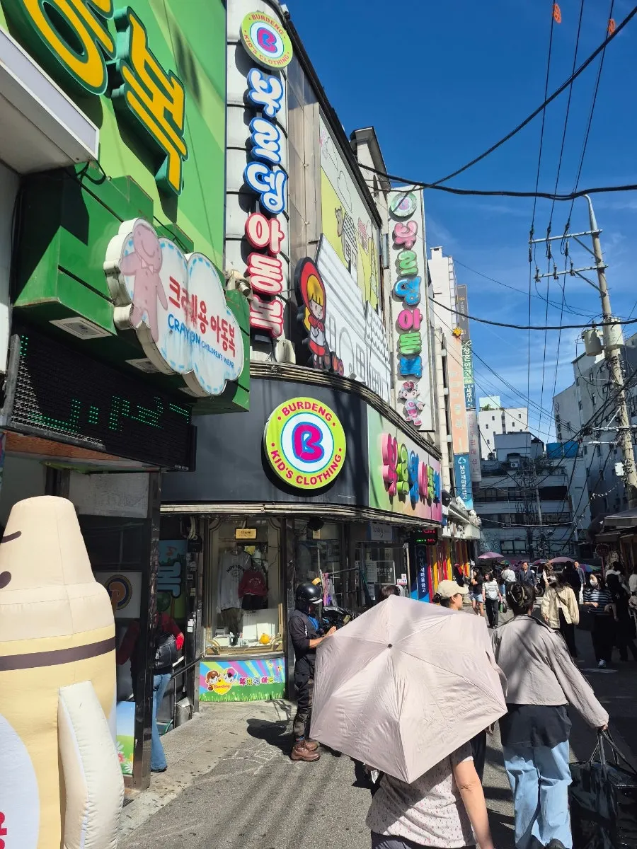 Kids' clothing shopping arcade alley near Hoehyeon Station in Namdaemun Market