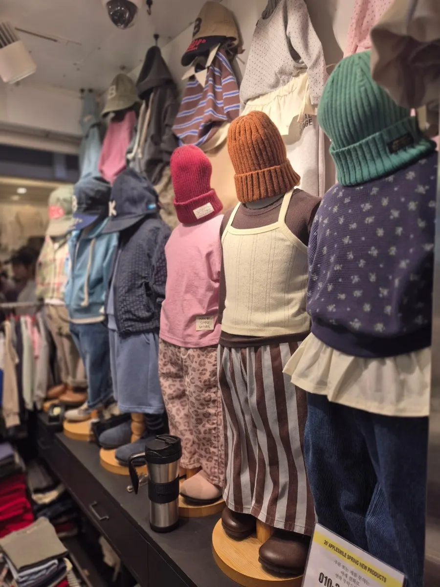 Display rack hung with new fall kids' clothes
