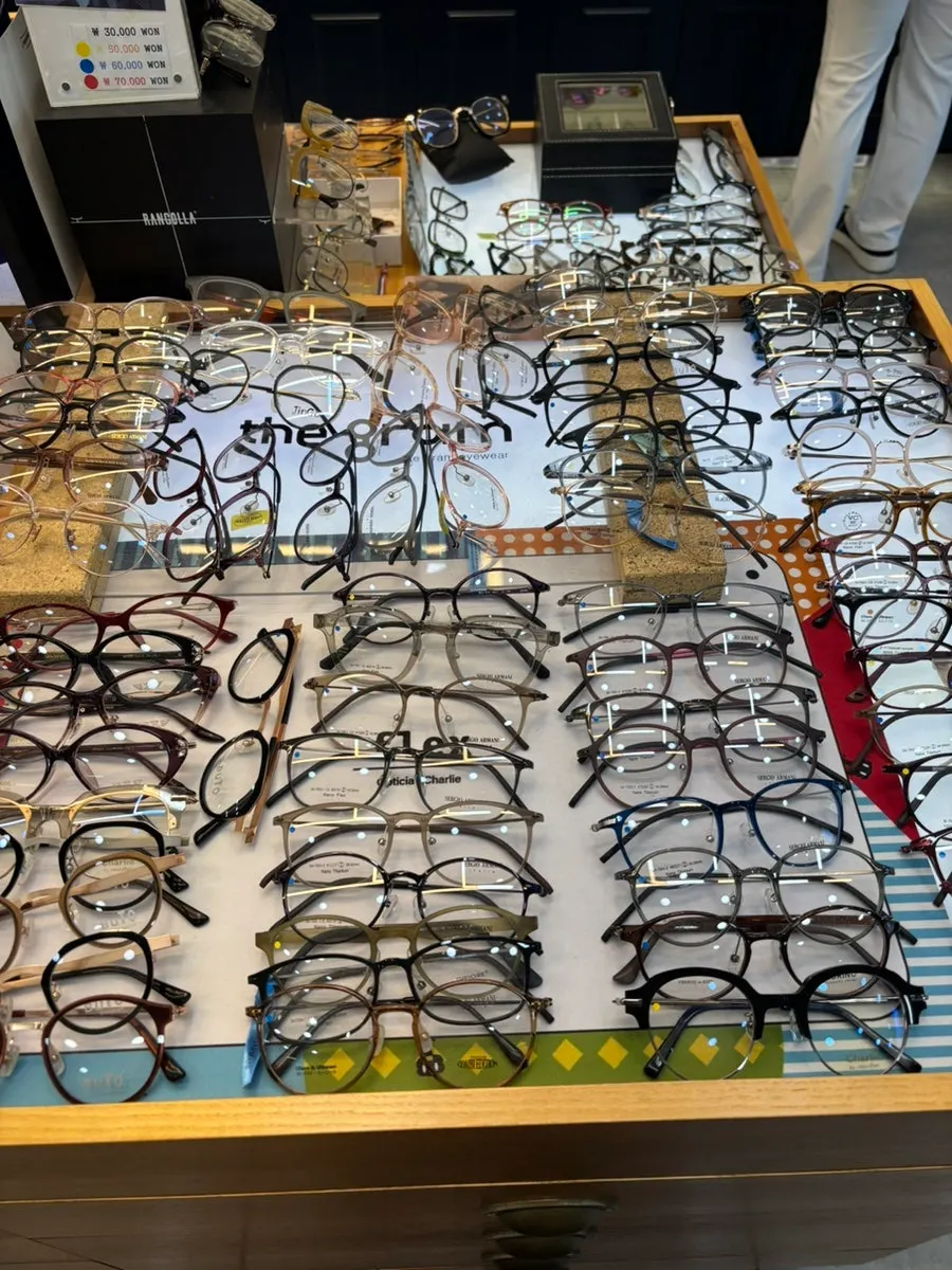 Wall display of frames at 007 Optical