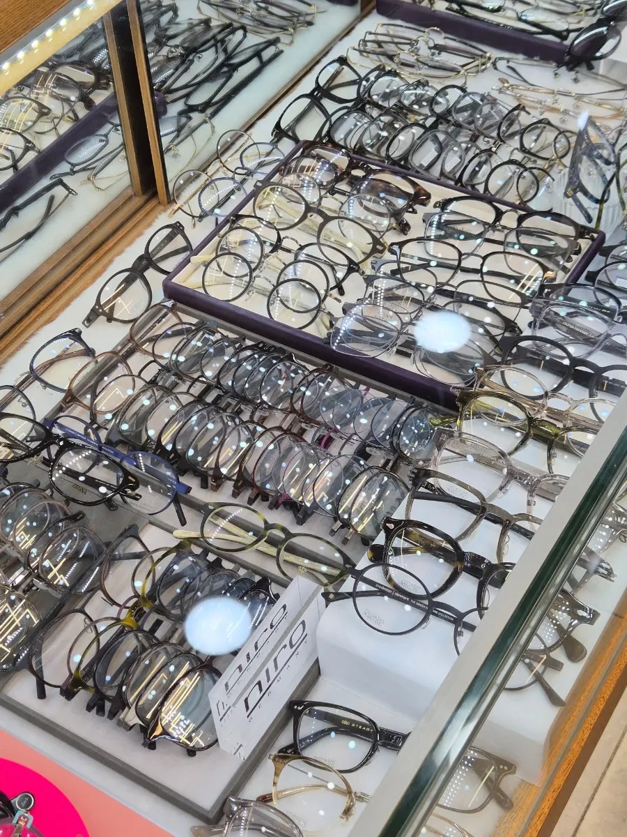 Frame displays typical of a shop in the Namdaemun eyewear district