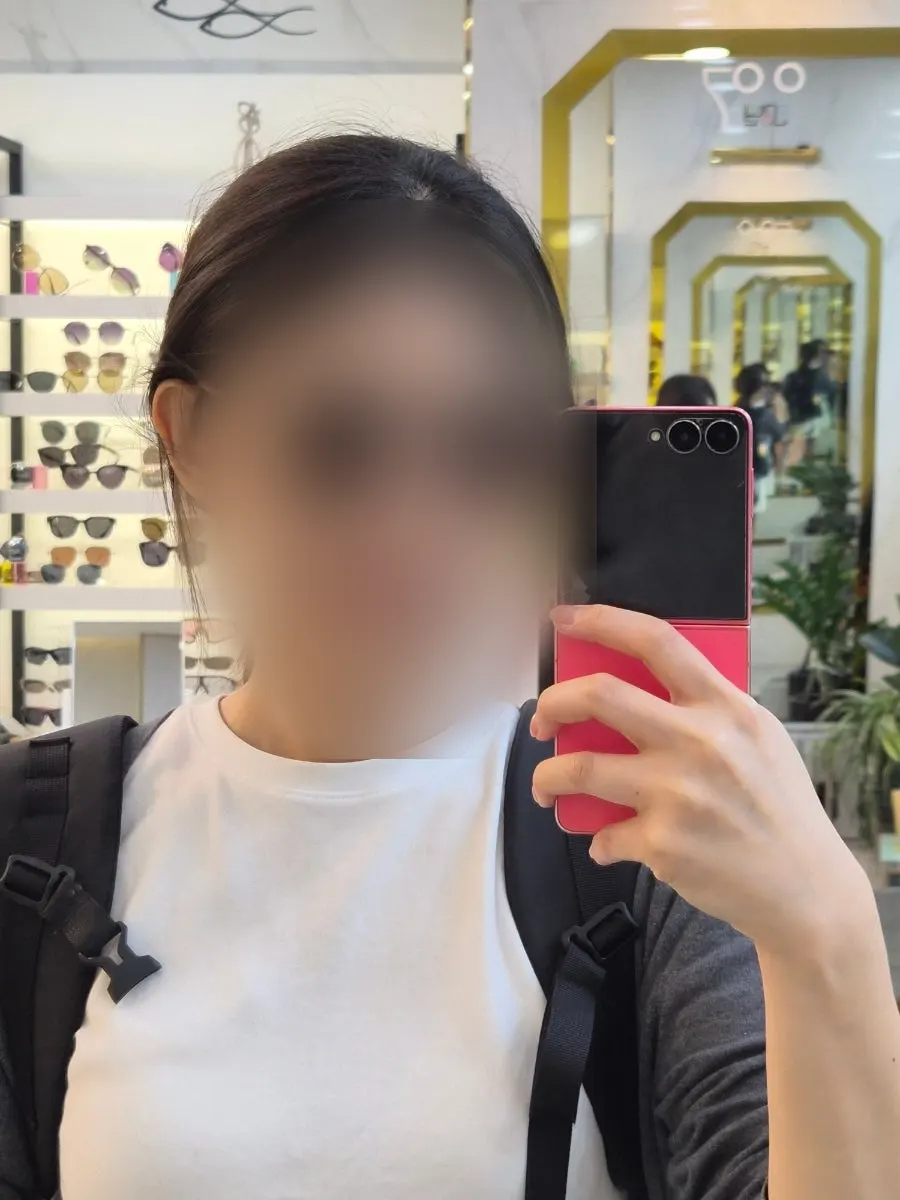 Face outline still visible while wearing the pale beige clear frames