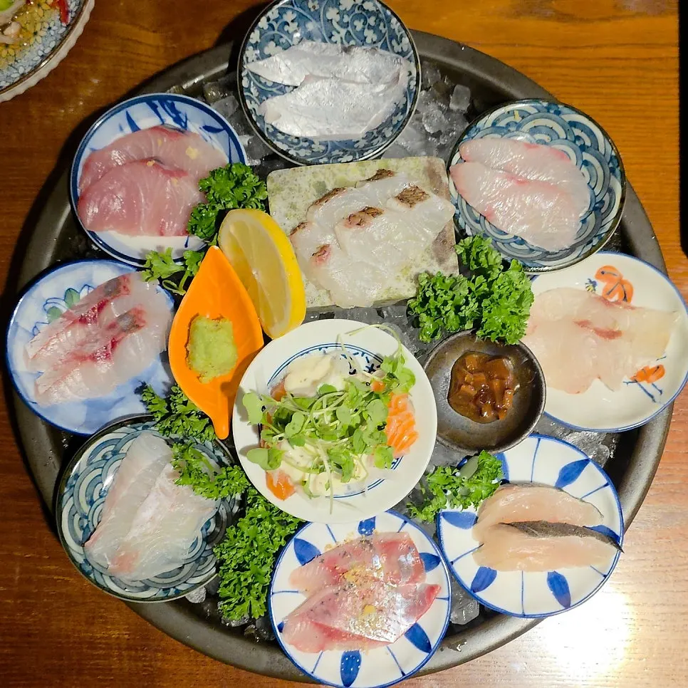 Two-person aged sashimi set shared with a friend
