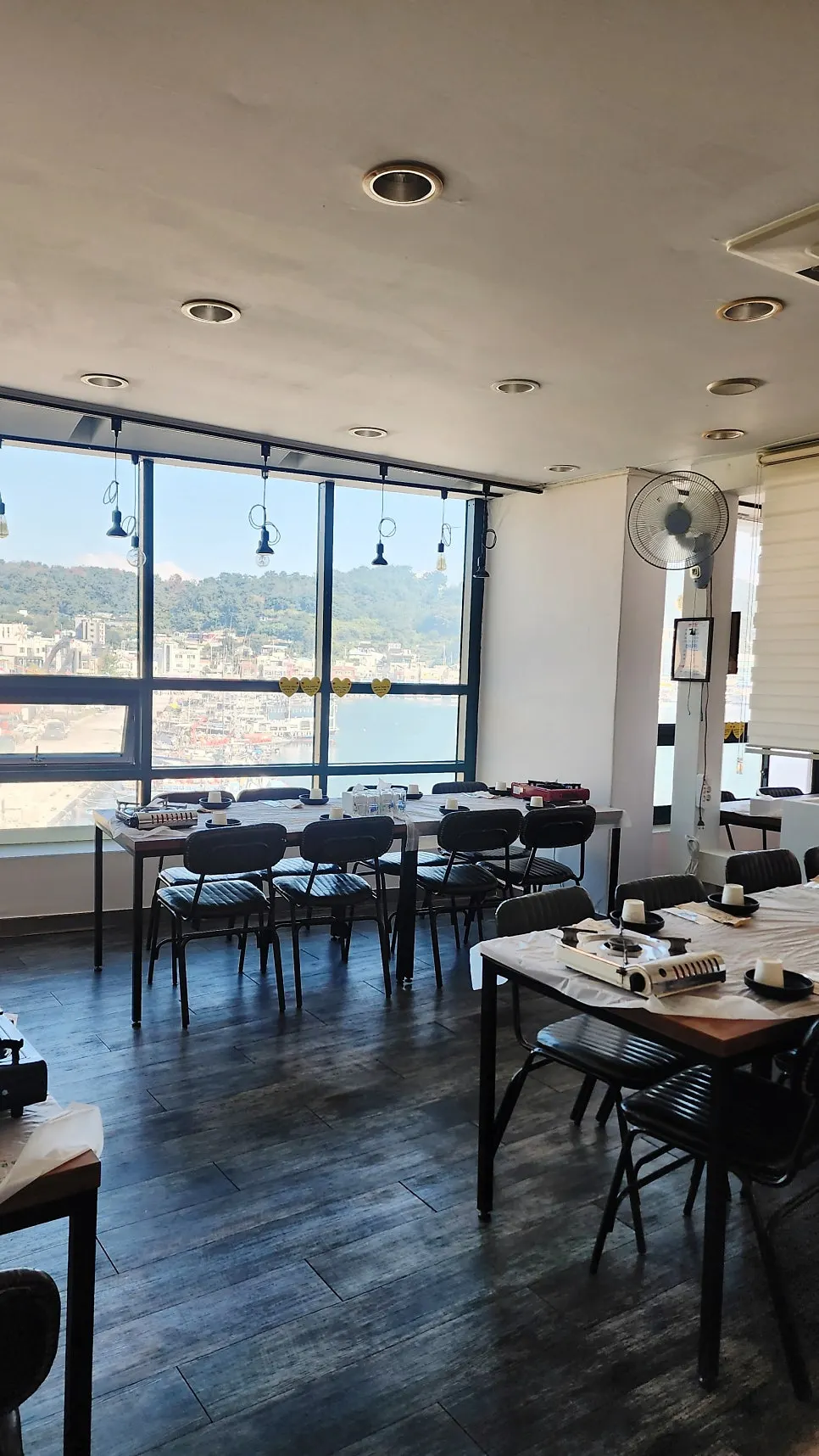 Dining hall with window seats and generously spaced tables