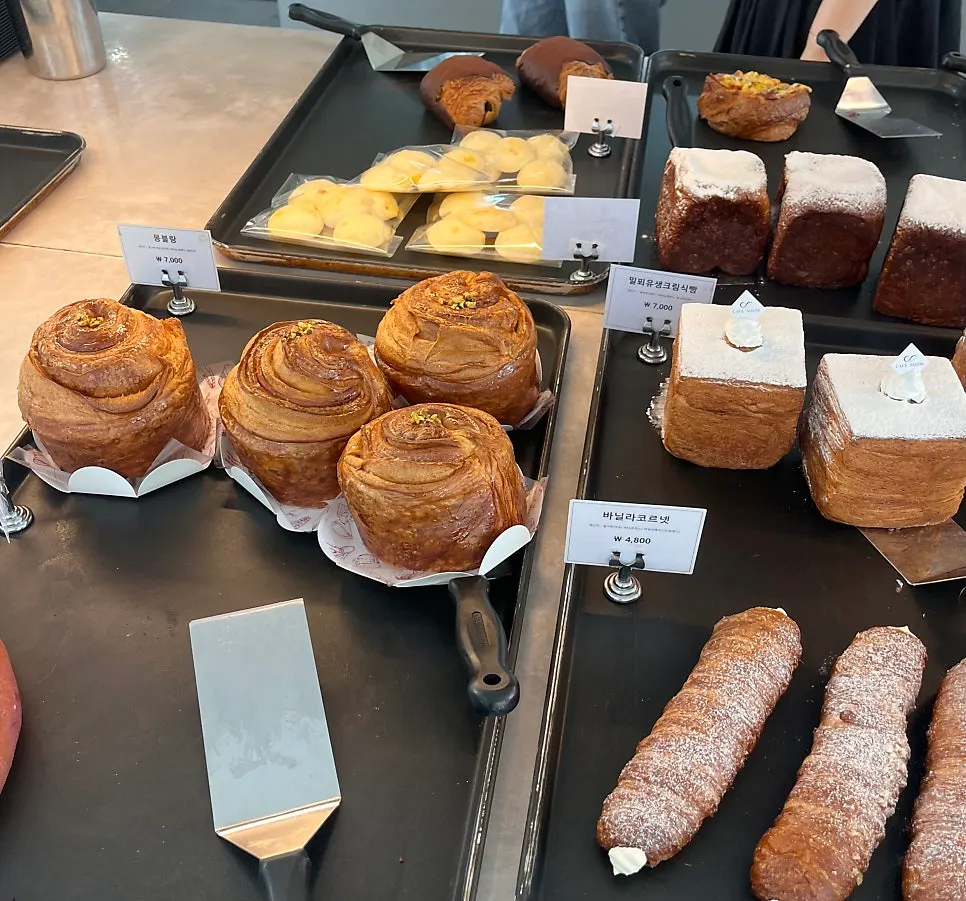 Various baked goods including briquette bread and financiers