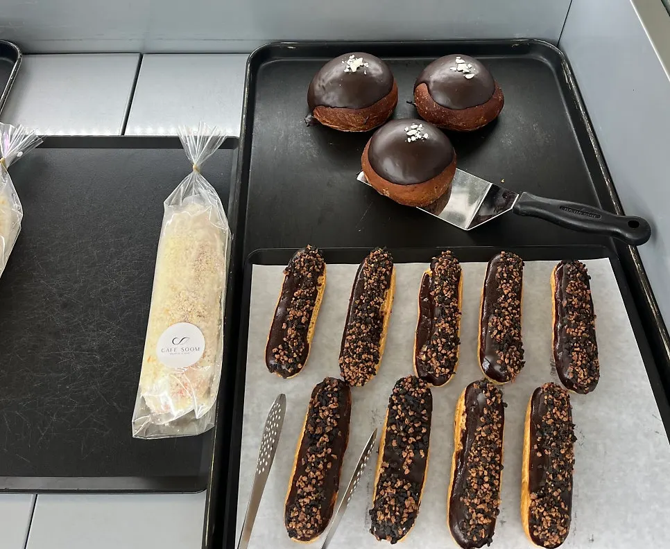 Sum's bread counter stocked with a variety of types