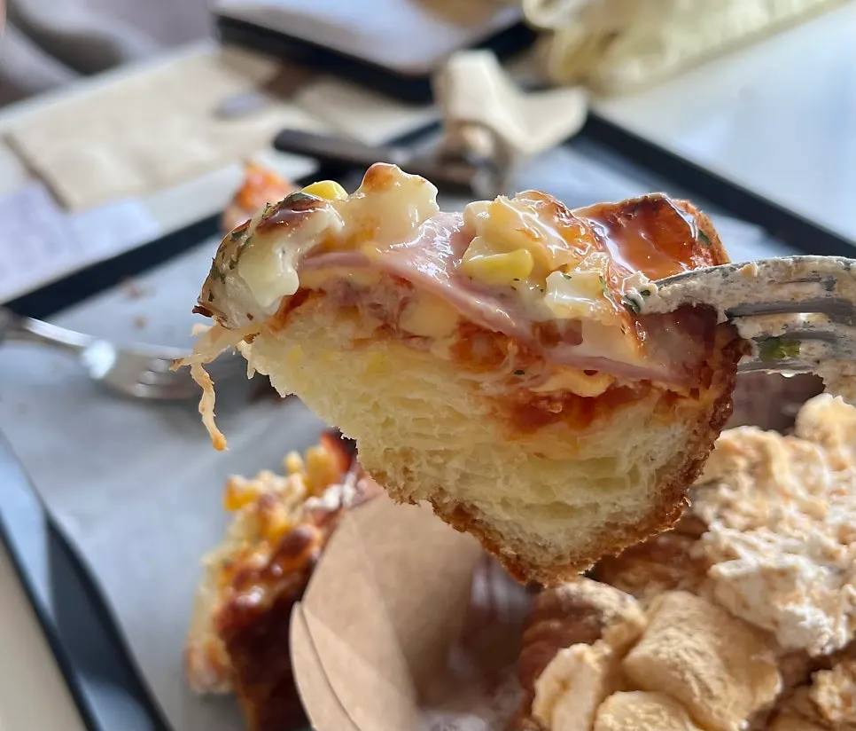 The thick ham-cheese corn bread with an Americano