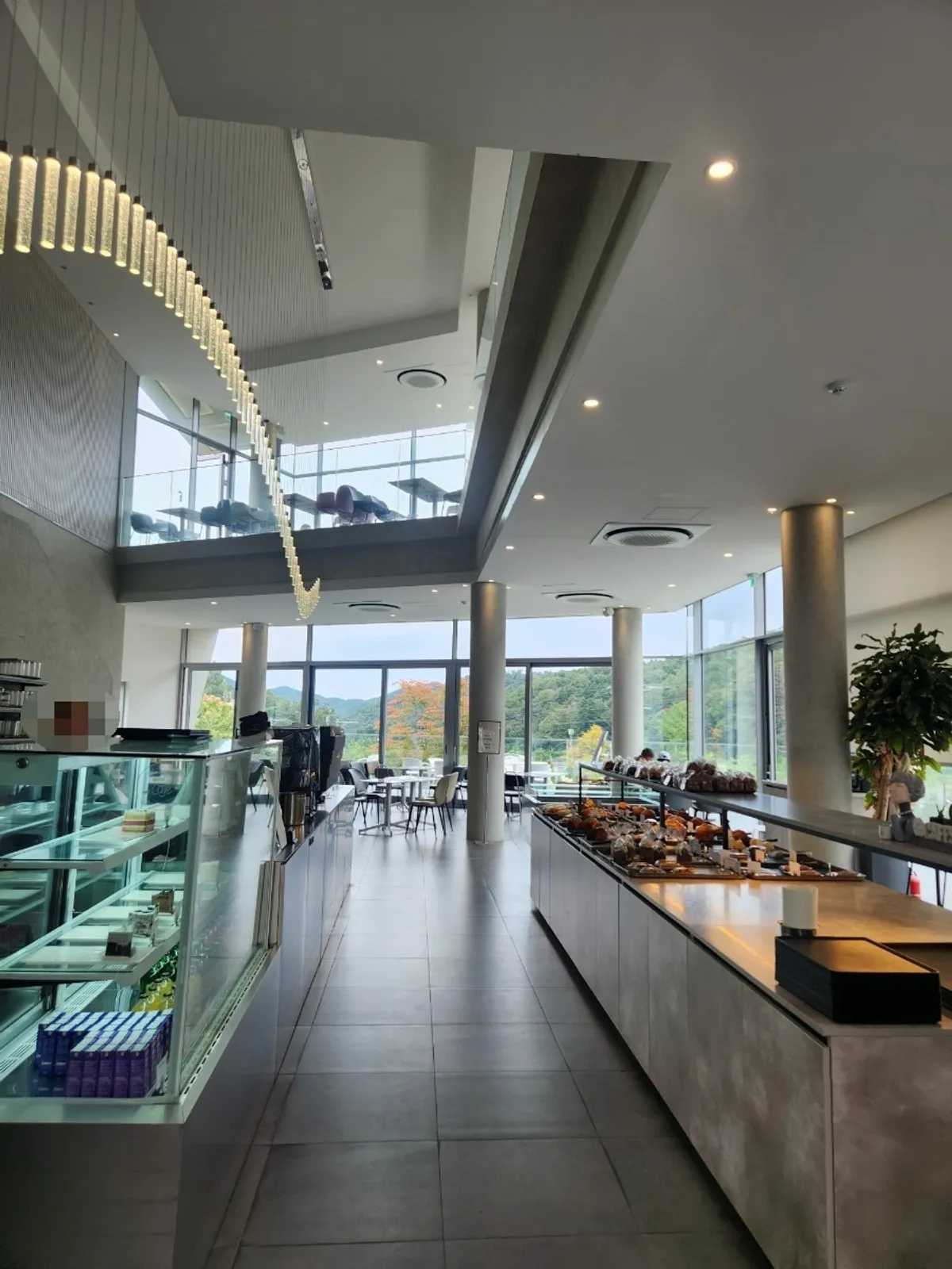 Exterior of Sum surrounded by mountains and trees