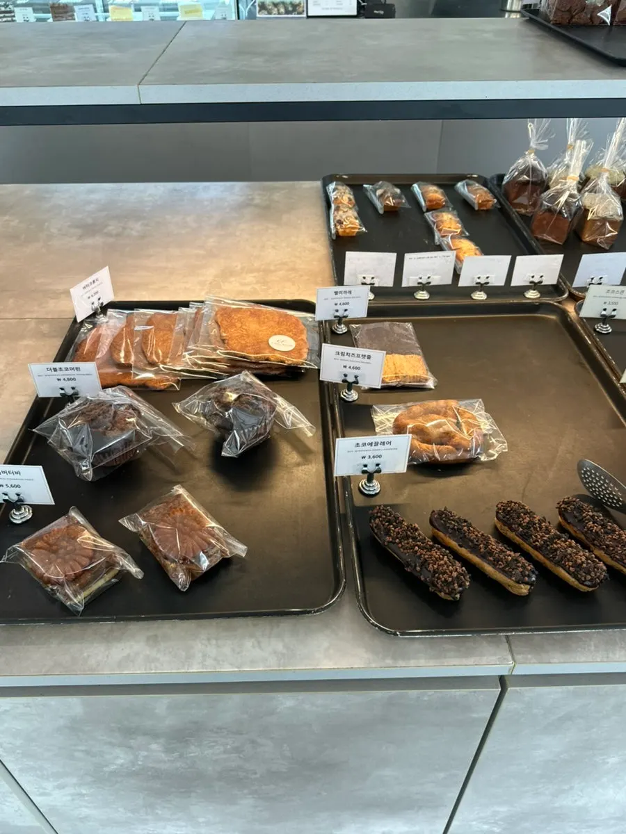 Close-up of Sum's bread display case