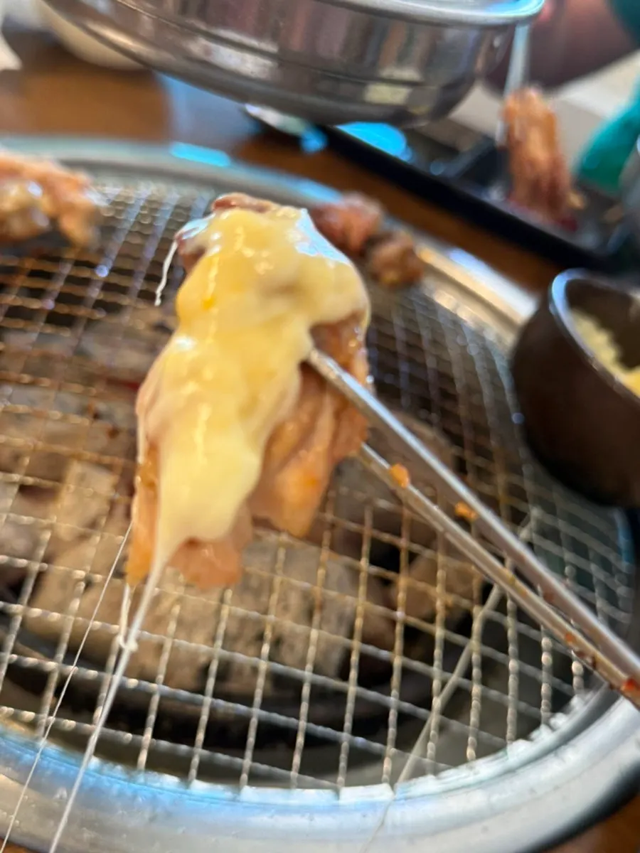Cheese fondue paired with charcoal dakgalbi