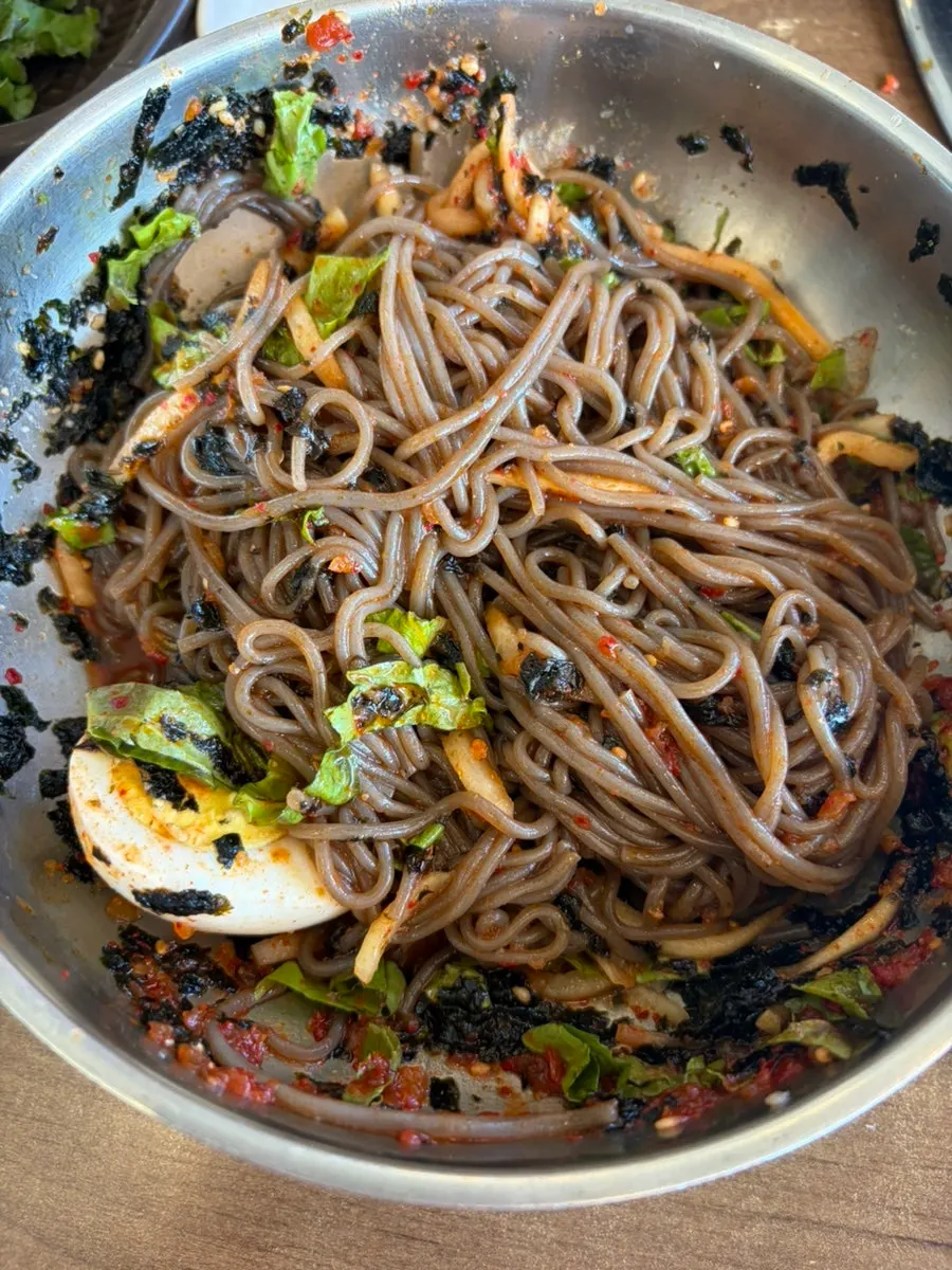 Buckwheat mak guksu served alongside dakgalbi