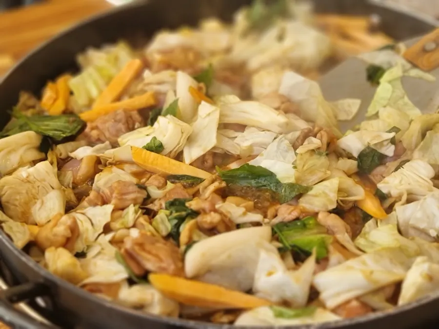 Soy sauce hot-plate dakgalbi cooking on the griddle