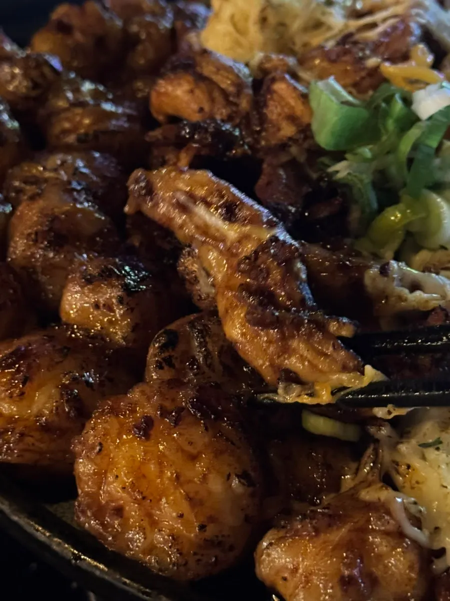 Chicken thigh grilled with open-flame char