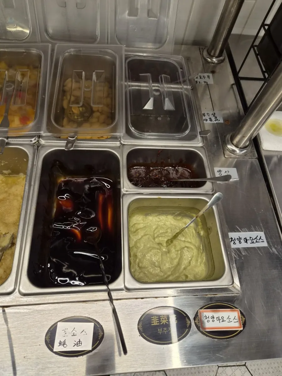 Self-bar with macaroni salad and fruit cocktail