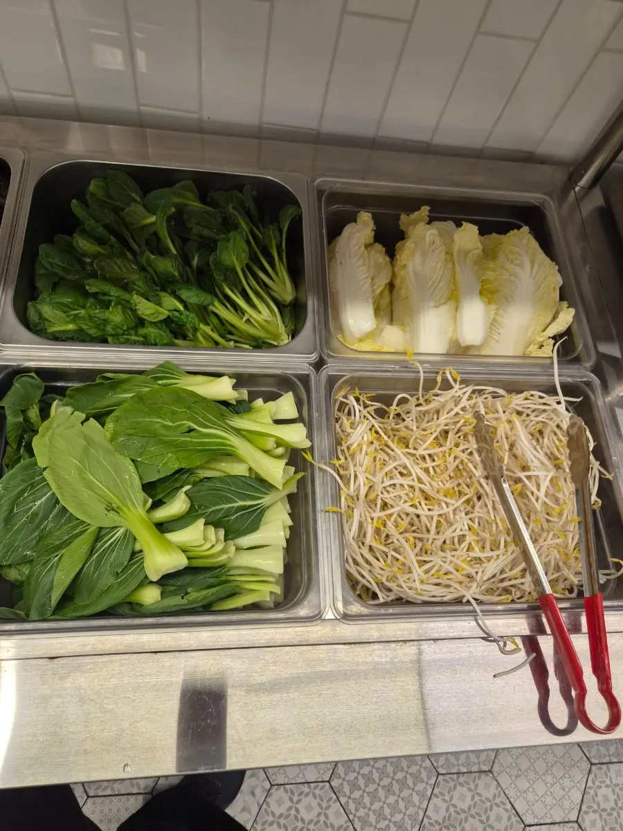 Vegetable corner with mushrooms, bok choy, napa cabbage, and bean sprouts