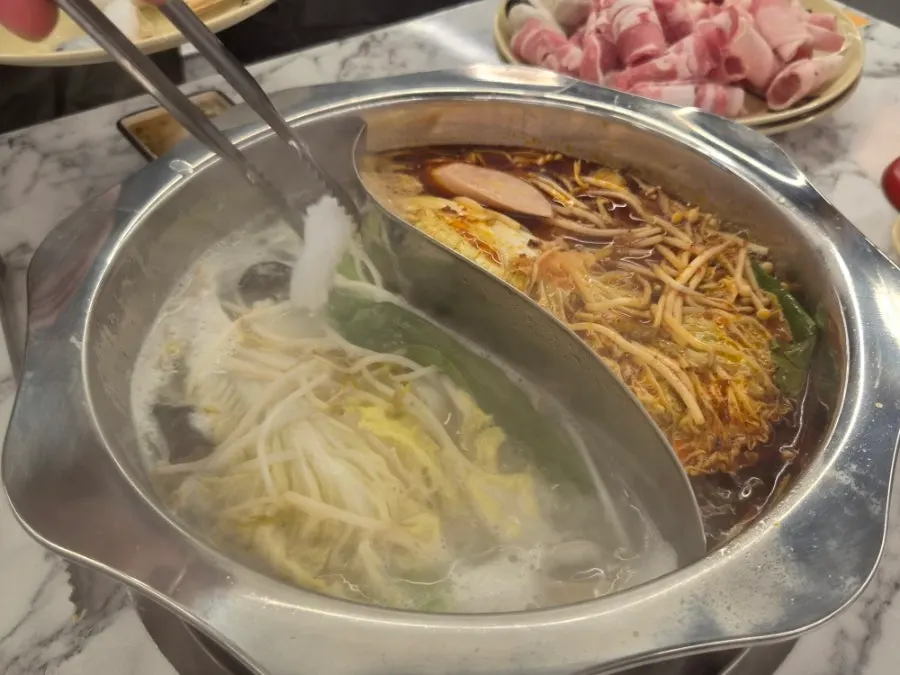 Hotpot with a divided pot for white and red broth