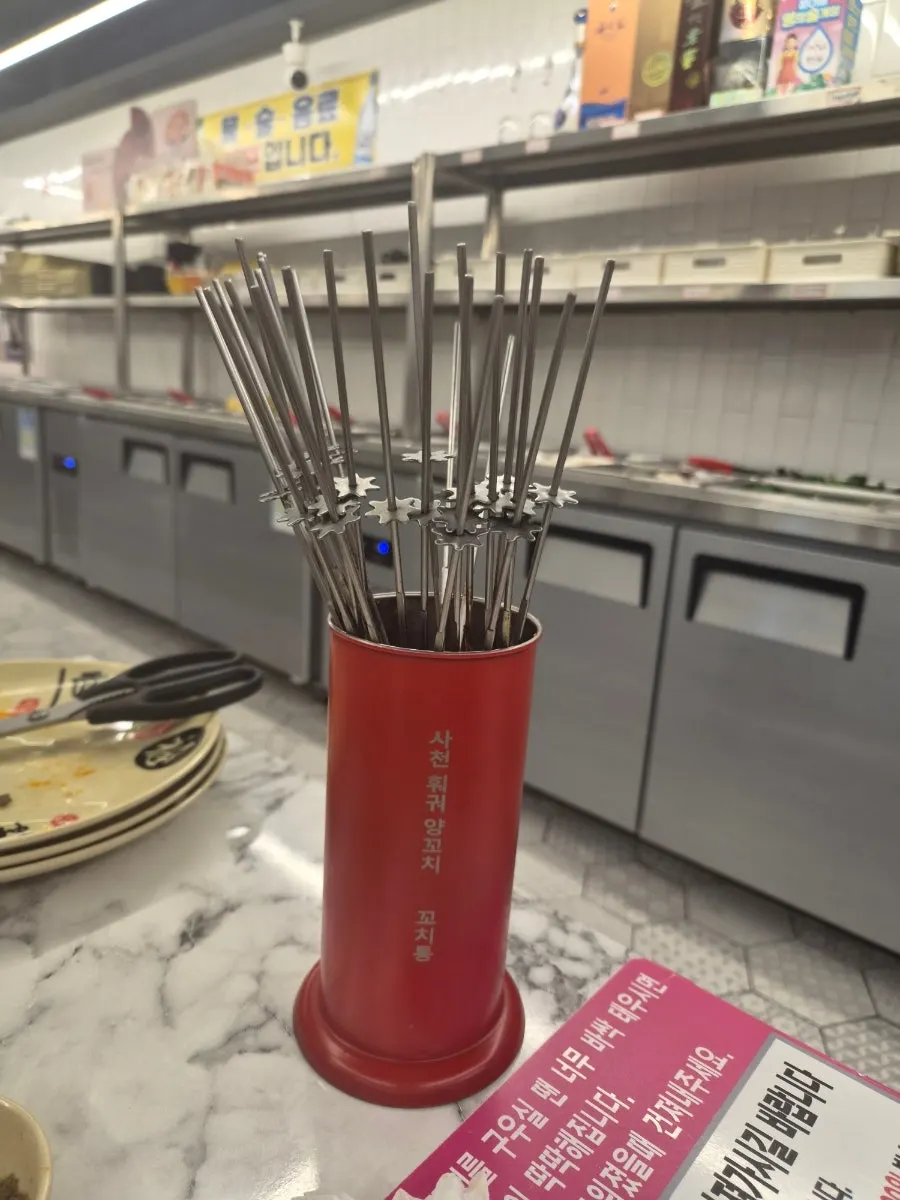 Bucket for collecting finished skewers