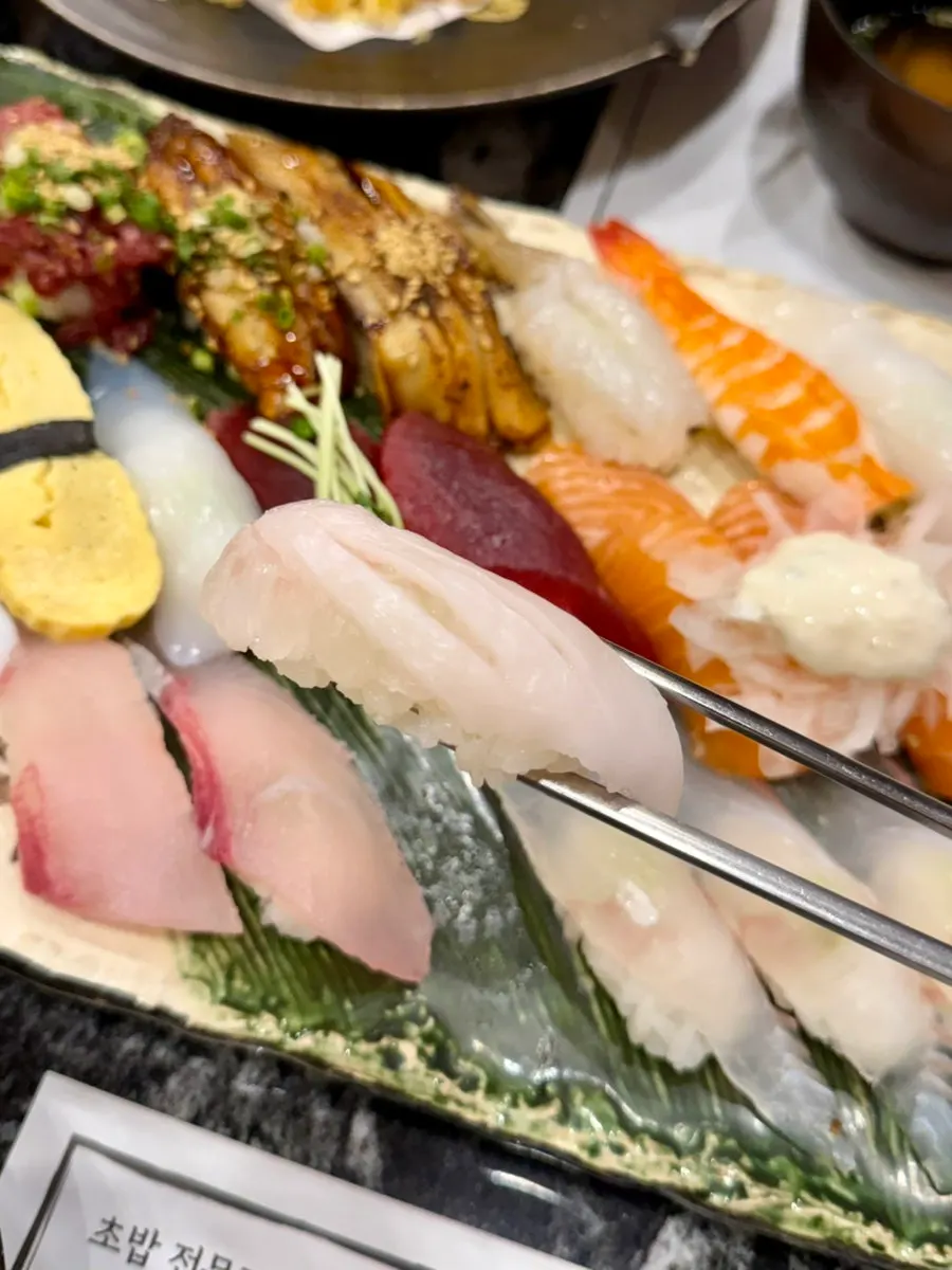 Sushi set with salad and clear soup