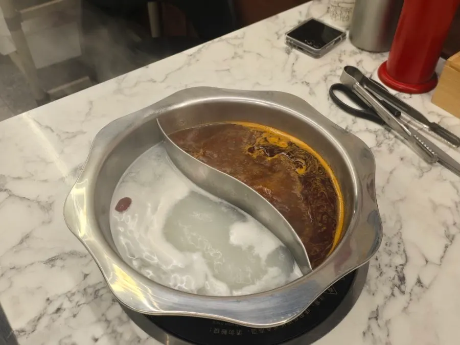 Hotpot with half white broth, half red broth