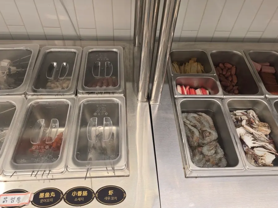 Self-bar with meatballs, fish cake, and other hotpot ingredients