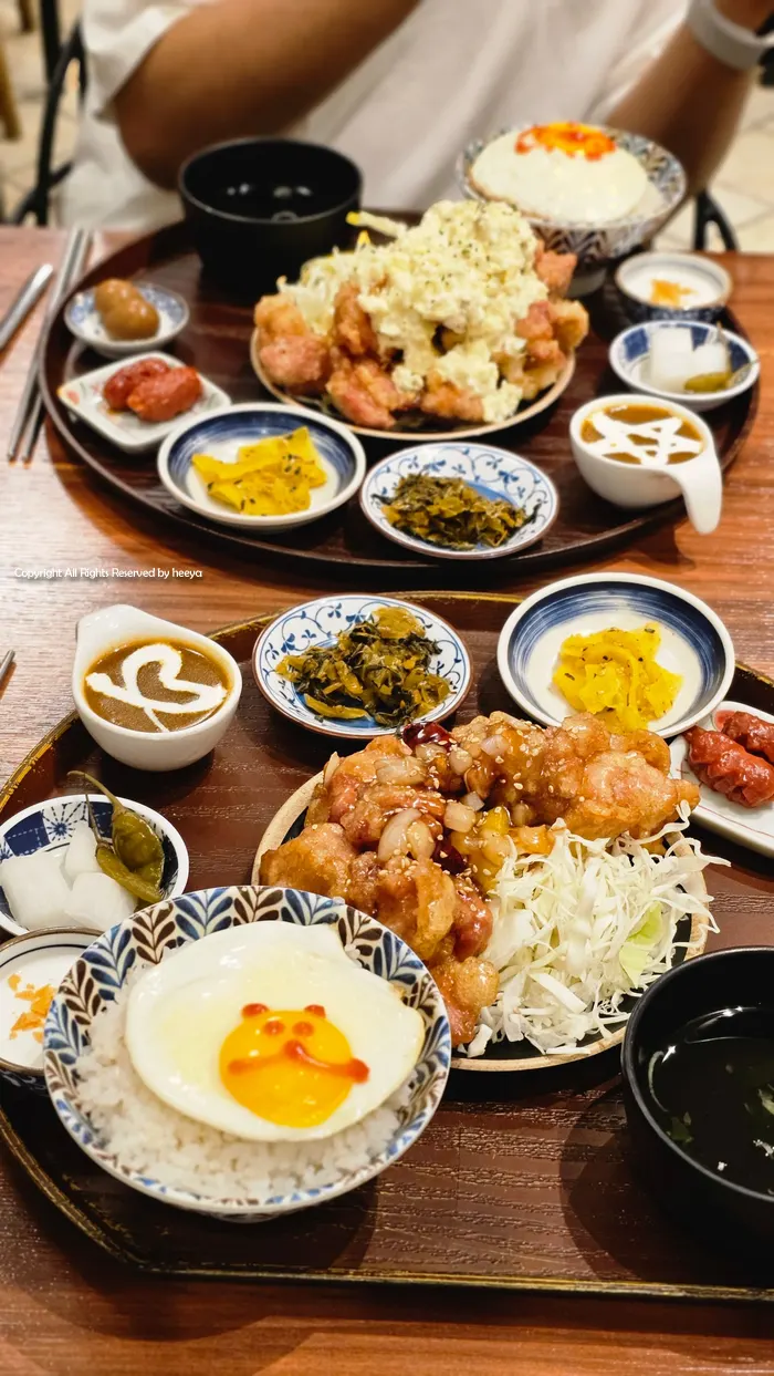Curry and tonkatsu sets on the Daidokoro menu board