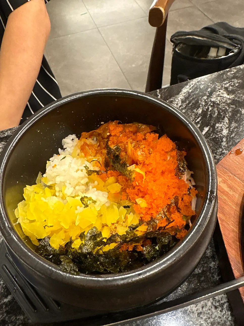 A-set dishes being set out on the table one by one