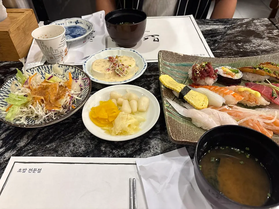 Close-up of sushi showing the rice and raw fish combination