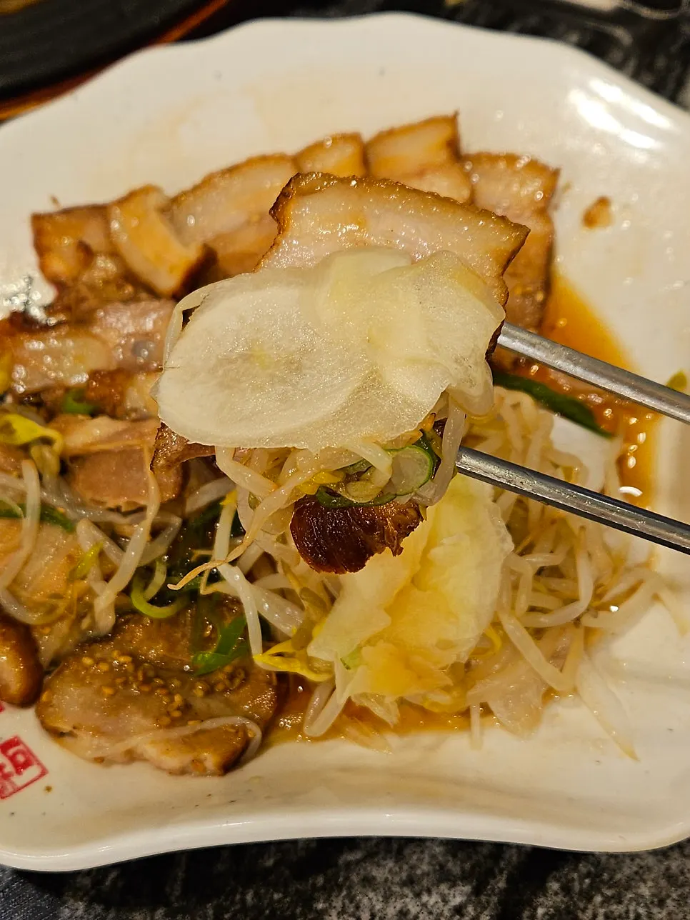Tender char siu pulling apart along its grain